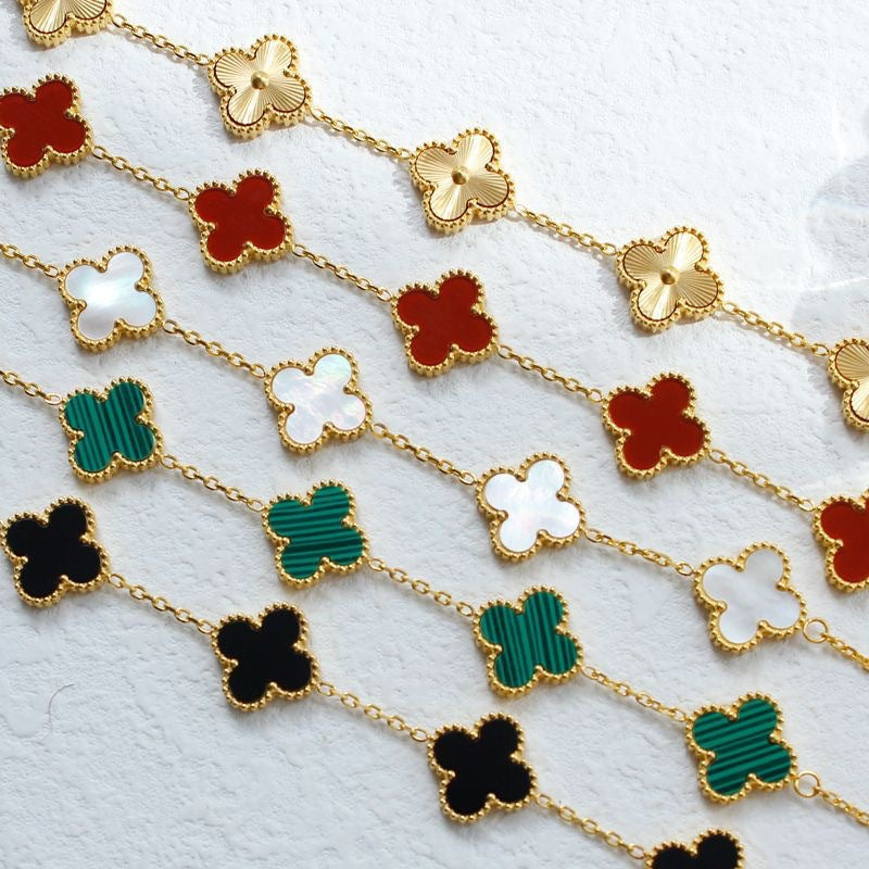Four leaf clover bracelet (18k gold)